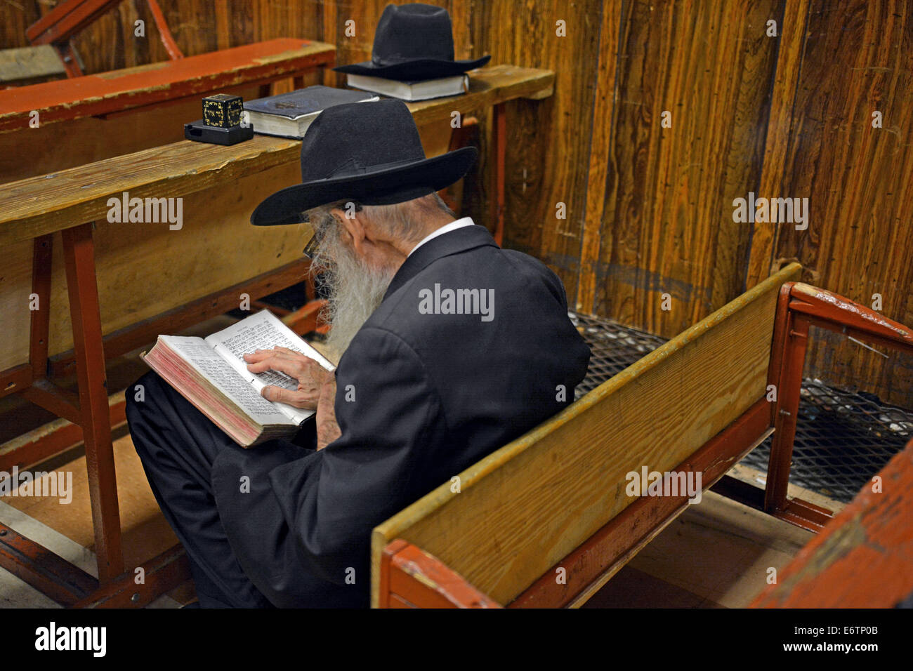 Tisha B'Av morning services at a synagogue in Brooklyn commemorating the destruction of the first two holy temples on Jerusalem. Stock Photo