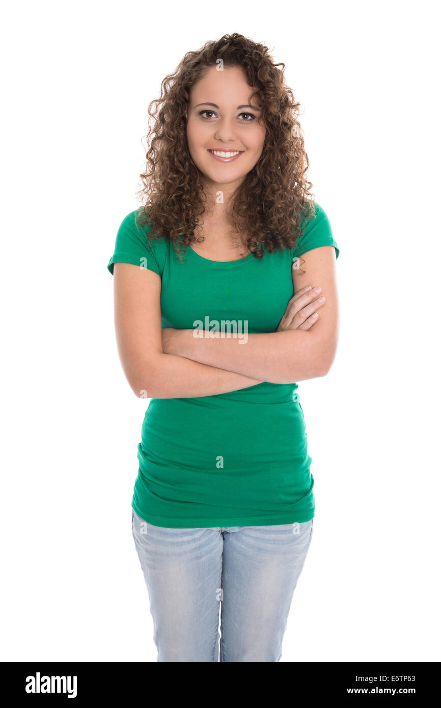 Pretty isolated young woman in green shirt and blue jeans isolated over white background. Stock Photo