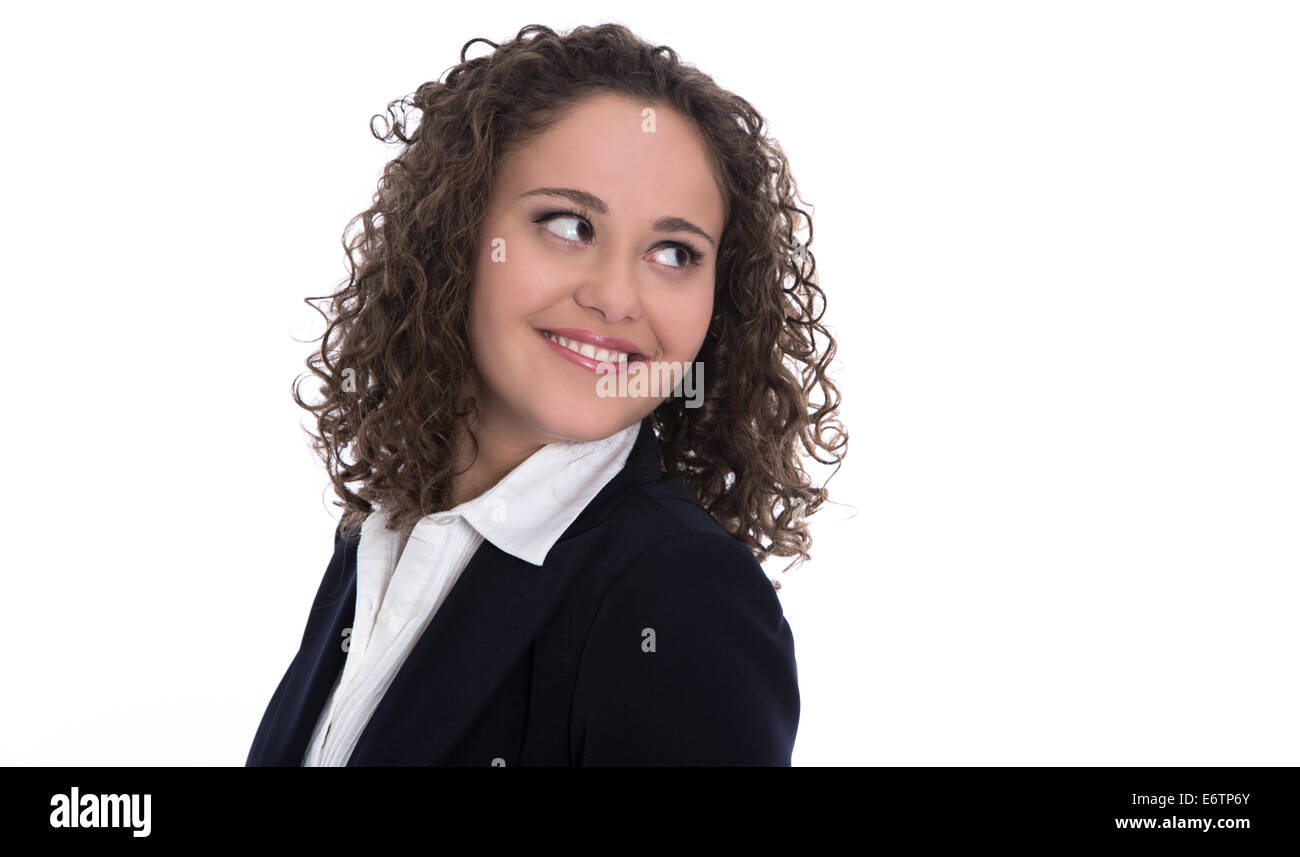 Isolated pretty young business woman looking sideways with big eyes. Stock Photo