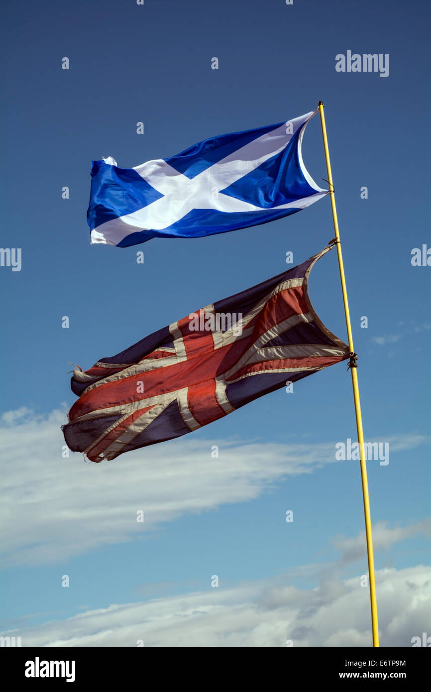 The St Andrew's cross or Saltire flag flying above a Union Jack. Stock Photo