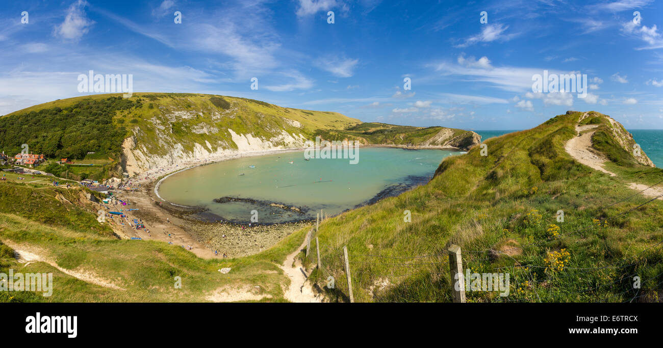 Panoramic wide shot of Lulworth Cove on the Jurassic Coast in Dorset England. Stock Photo