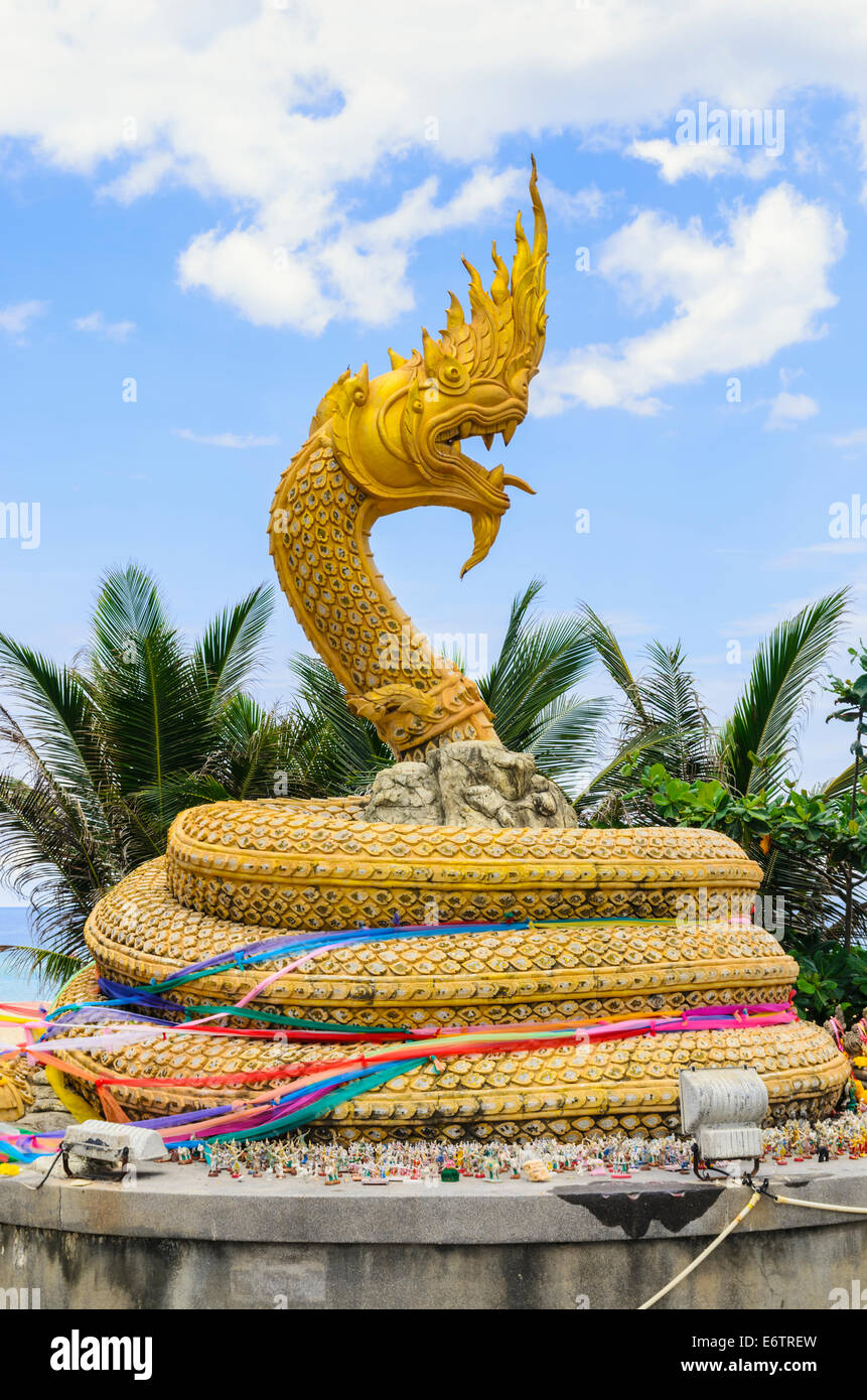 Mythical Naga serpent statue along the waterfront promenade of Karon Beach, Phuket Island, Thailand Stock Photo