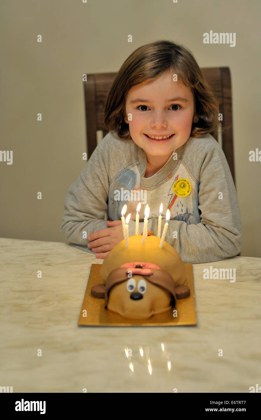 portrait of seven years old girl with birthday cake Stock Photo - Alamy