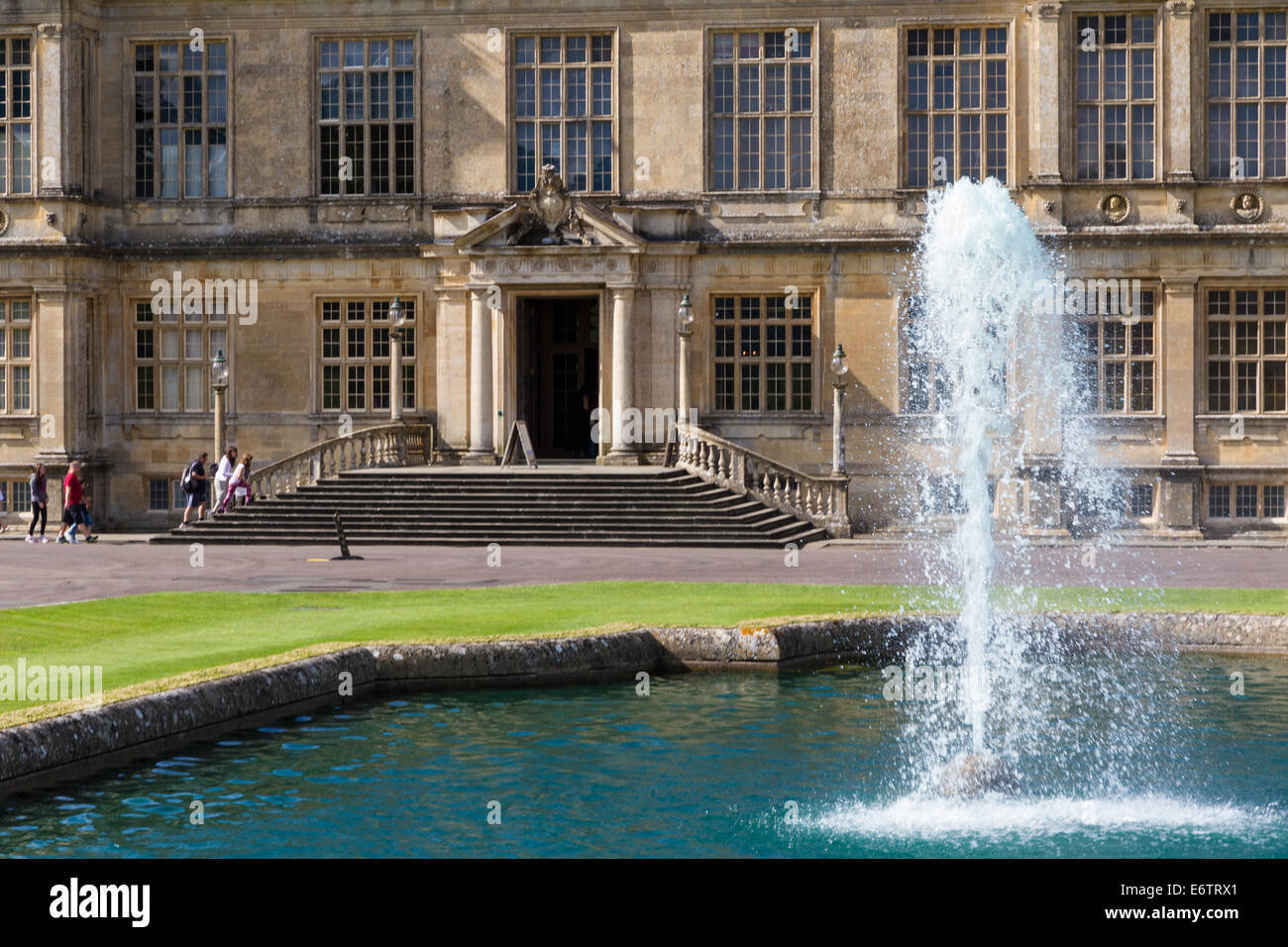 Longleat House with lawn and fountain. Warminster, Wiltshire. Stock Photo