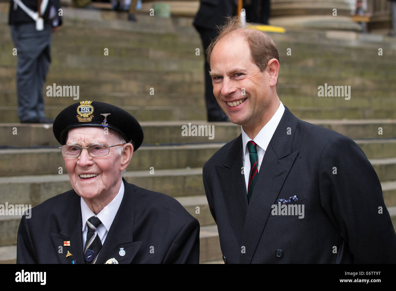 Liverpool, Merseyside, UK 31st August, 2014. H.R.H.  Prince Edward with Mr Albert Leek, 89  at Liverpool Pals commemoration and the re-enactment of the Liverpool Pals signing up to answer Lord Derby's call for recruits 100 years to the day it happened. Liverpool's success prompted other towns to form units, with civic pride and community spirit driving competition to raise the highest numbers. Stock Photo