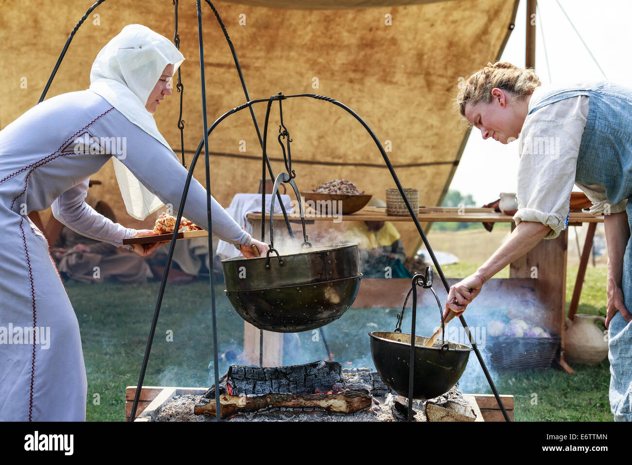 Reenactment of life in a Viking village, women preparing food, Icelandic Festival of Manitoba, Gimli, Manitoba, Canada Stock Photo
