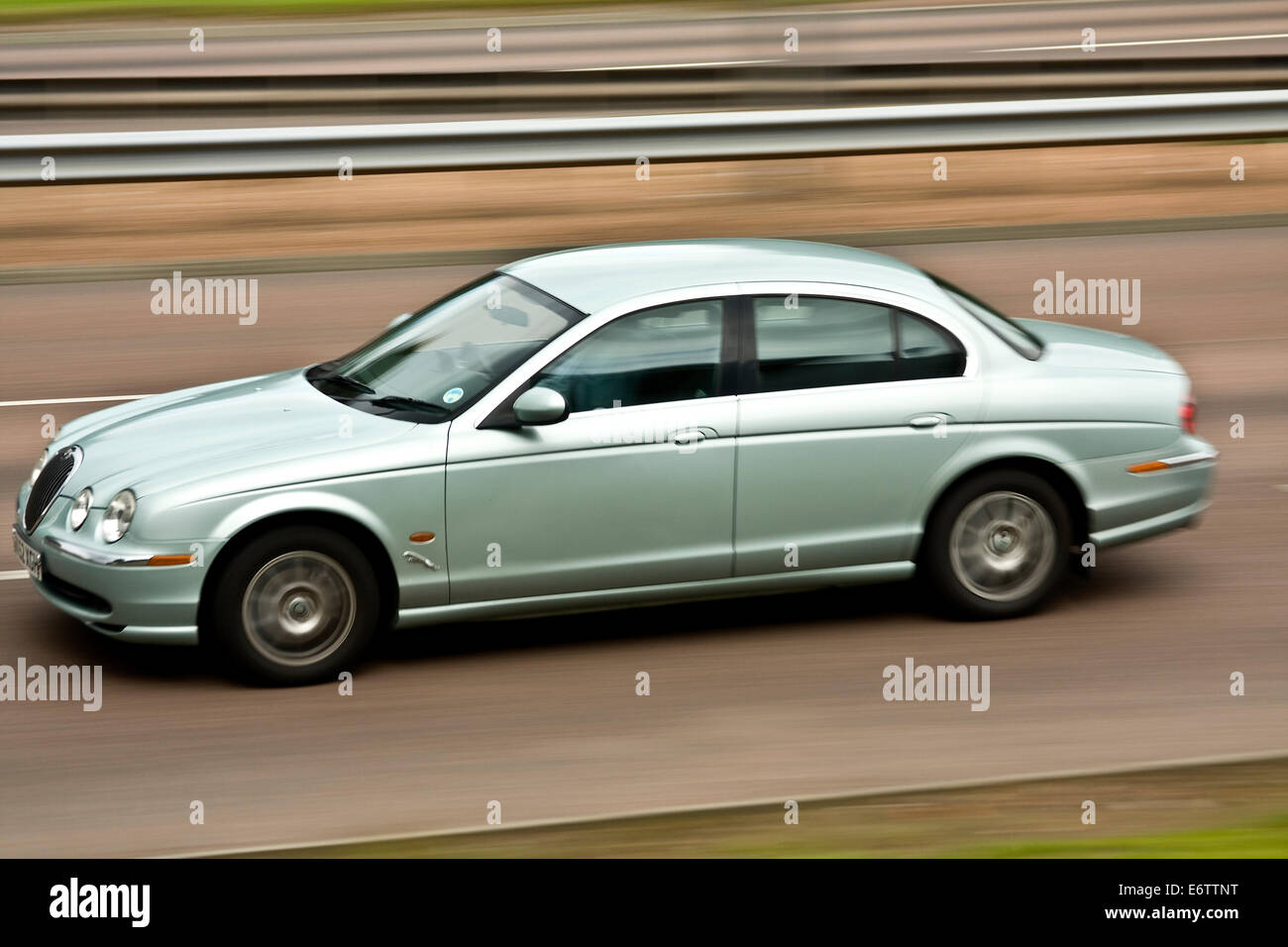 A luxurious Jaguar Daimler Car travelling along the Kingsway West Dual