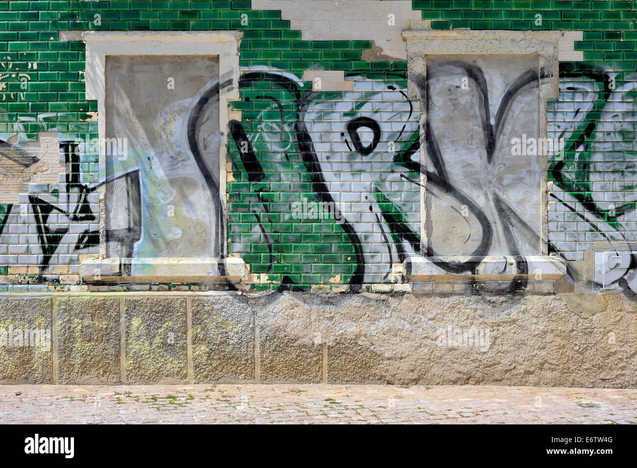 graffiti on green tiled abandoned house ark Stock Photo - Alamy