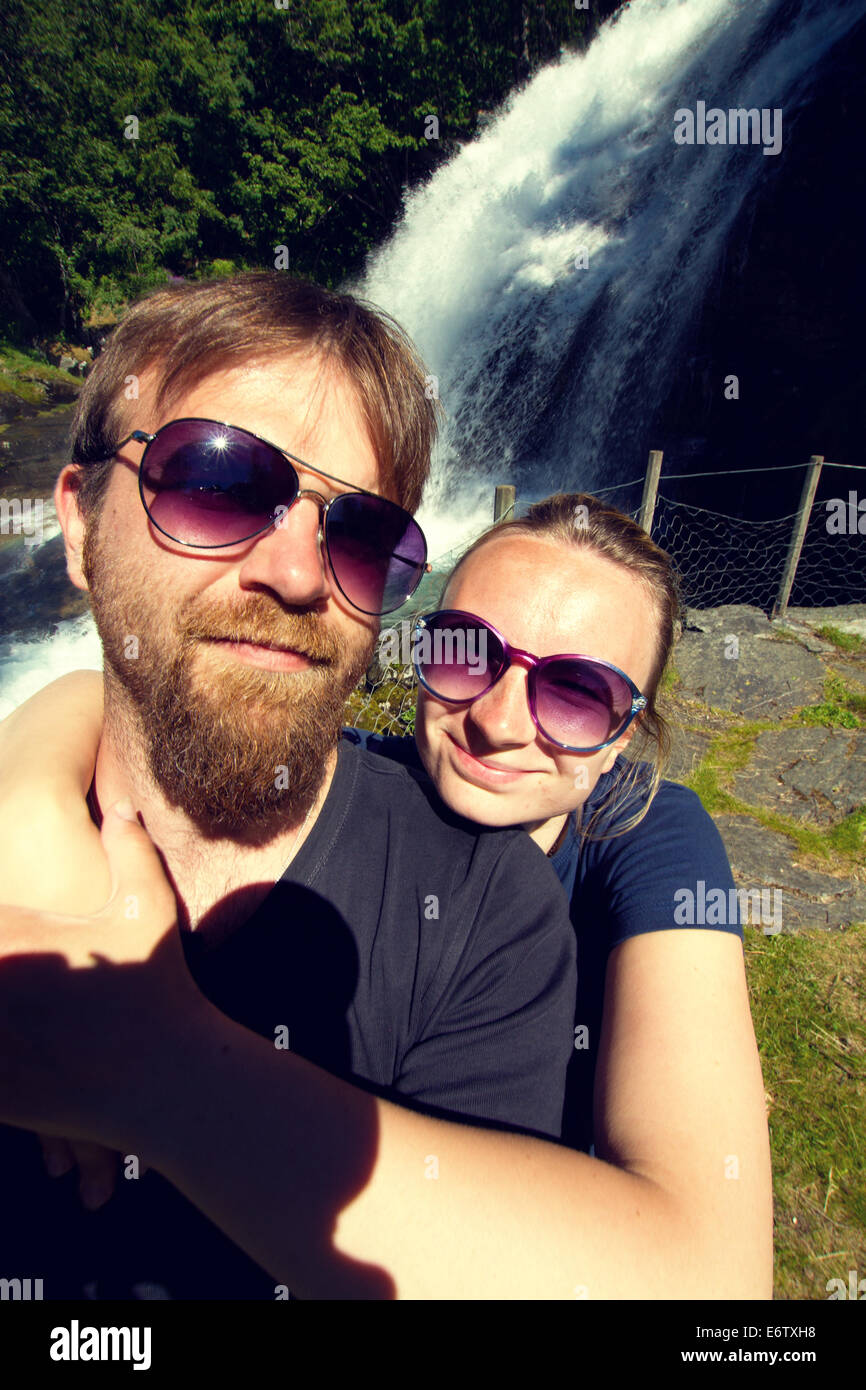 newlyweds honeymoon vacation in Norway. photo in the mountains near the lake. instagram. Stock Photo