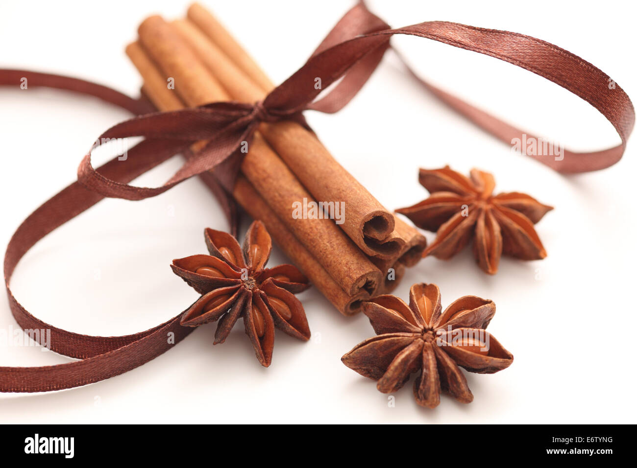 Cinnamon sticks and star anise. White background. Stock Photo