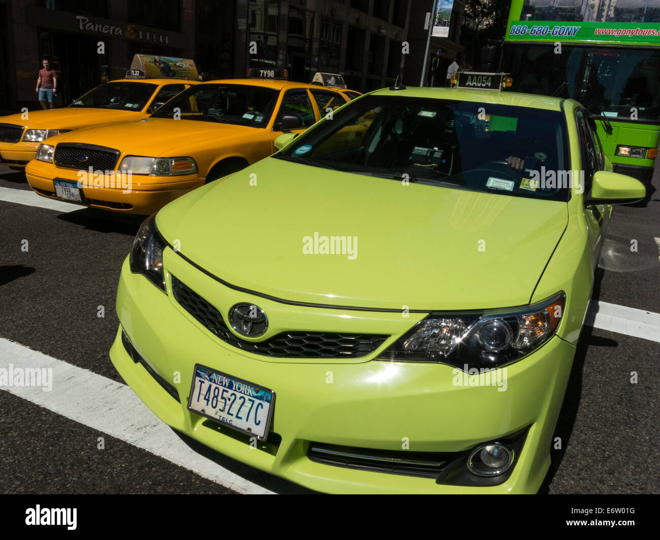 New InterBoro Taxi Cab and Yellow Cabs, NYC, USA Stock Photo