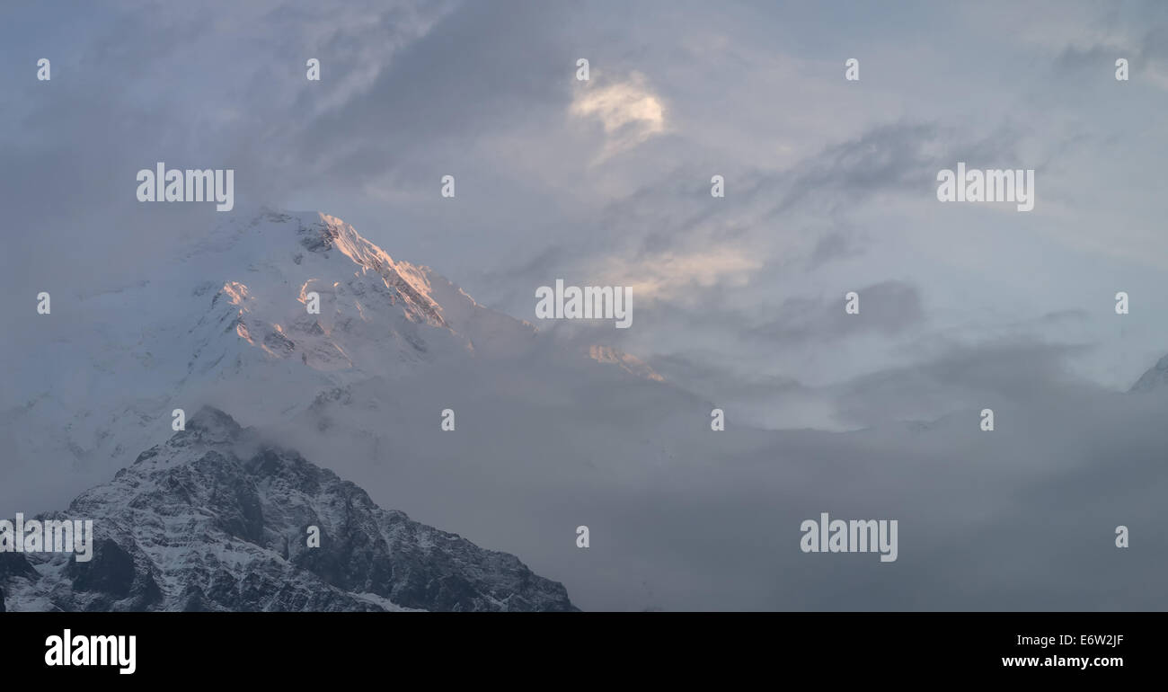 Sunrise on the Annapurna South mountain peak. Stock Photo