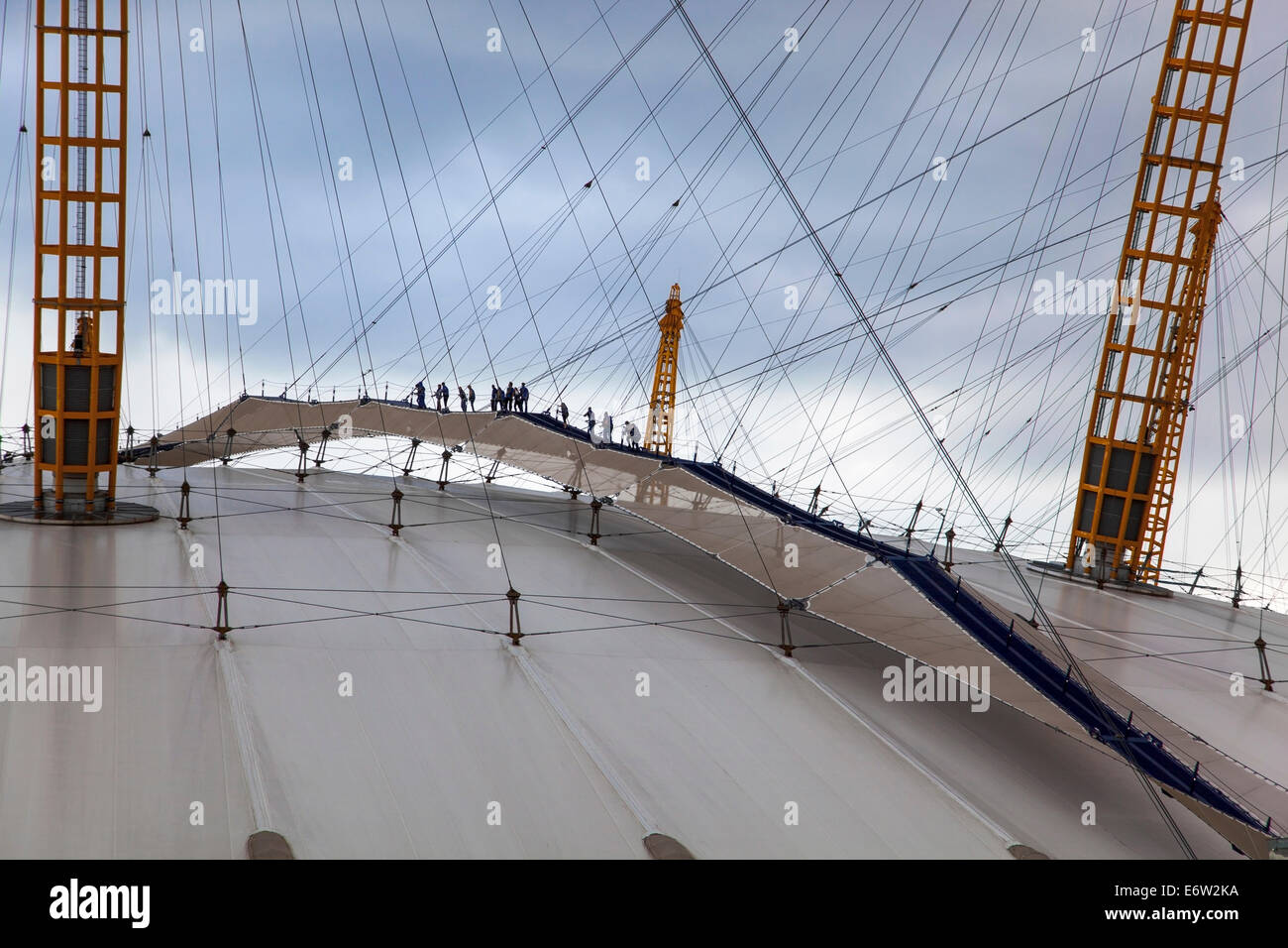 People climbing the O2 Arena dome roof, Greenwich, London Stock Photo