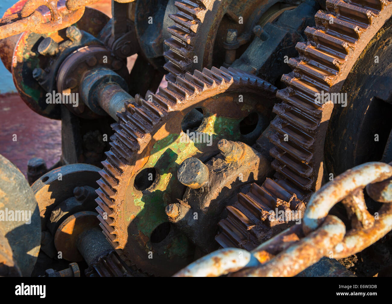 Aged technology: Old, antique and rusty gear wheel on an old ship - retro and vintage look. Stock Photo