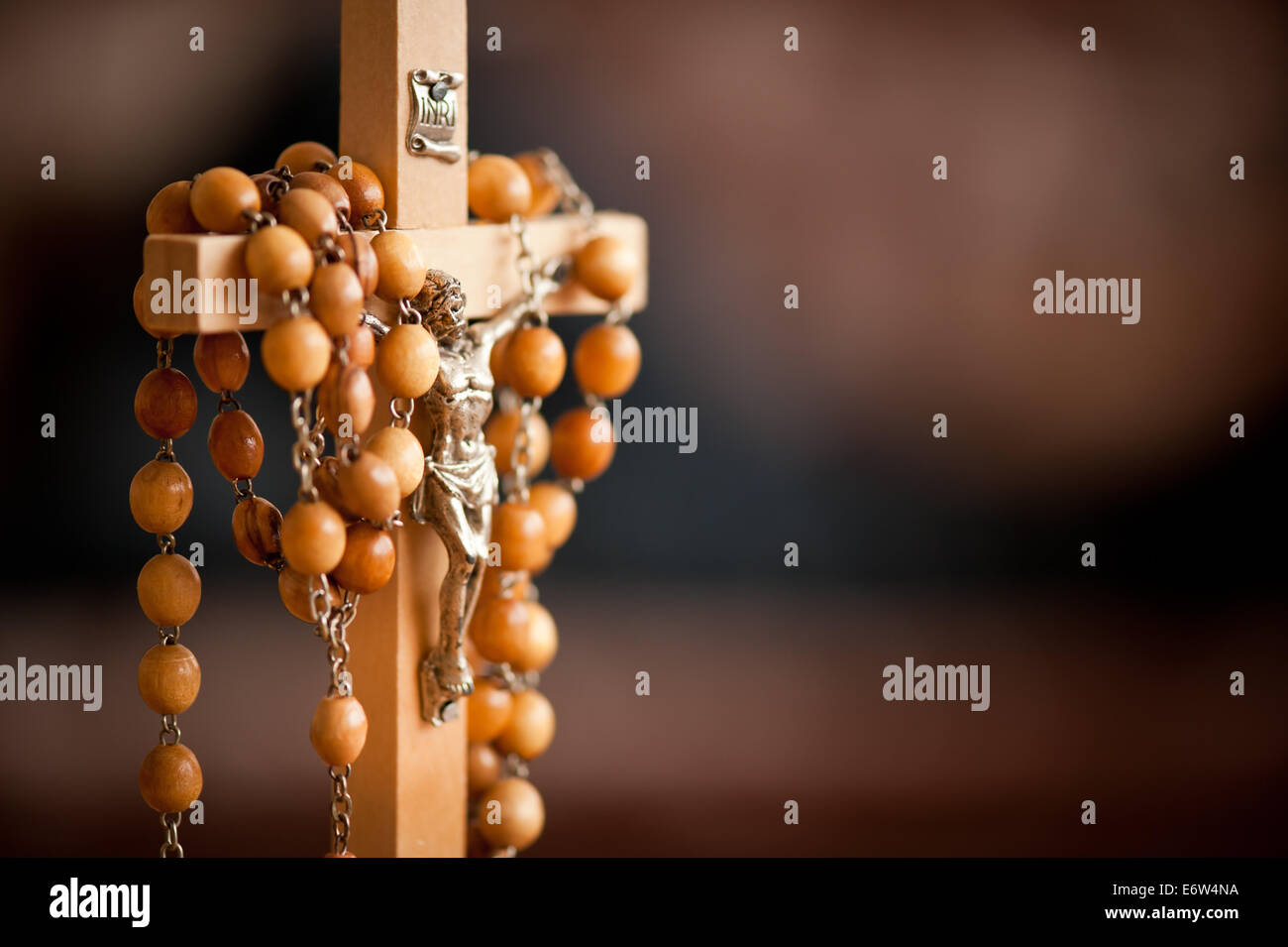 Jesus figurine and rosary Stock Photo
