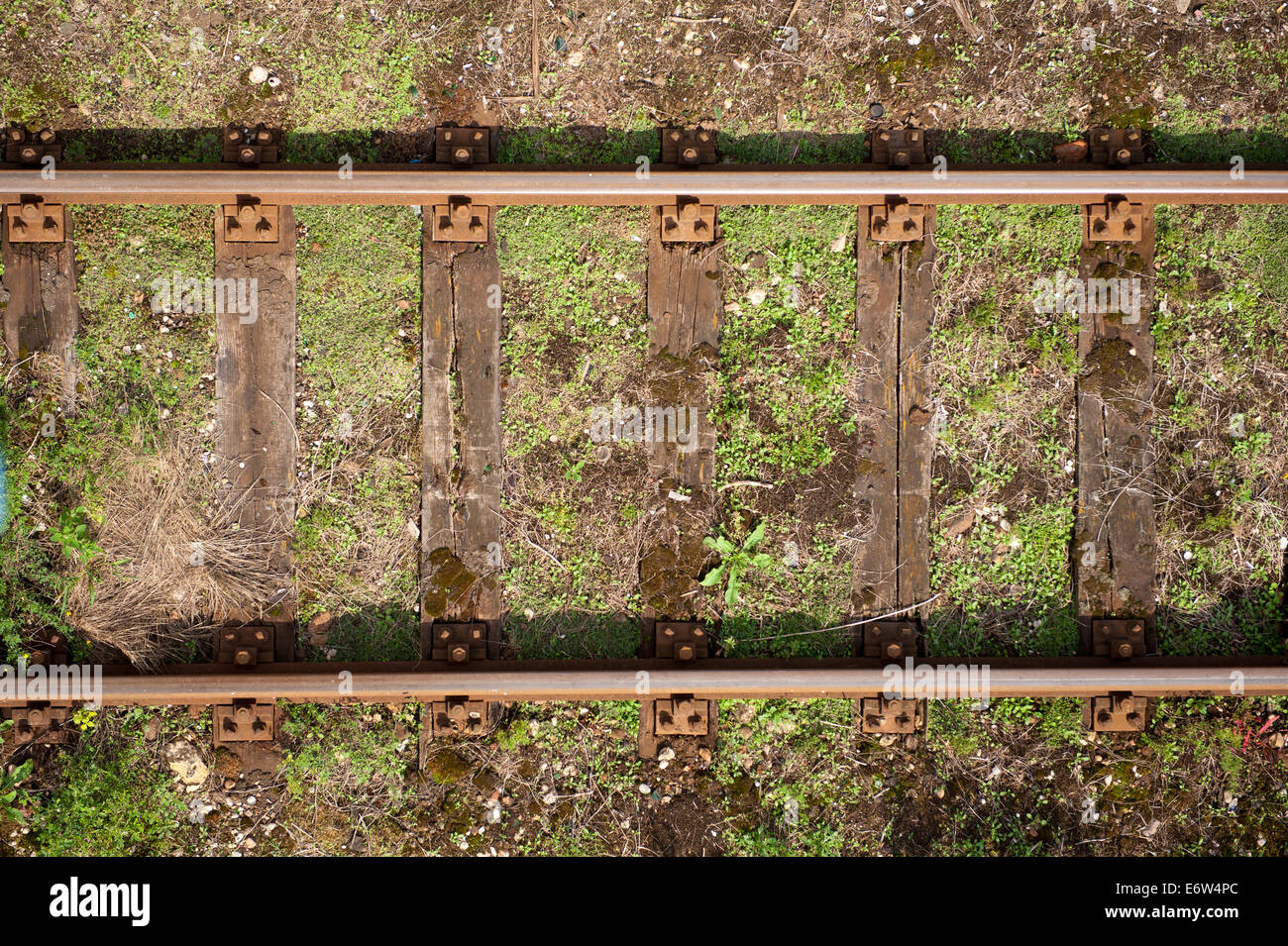 German text Streik (meaning strike) over rusty metal railway tracks and  brackets in a ballast bed, selected focus, narrow depth of field Stock  Photo - Alamy