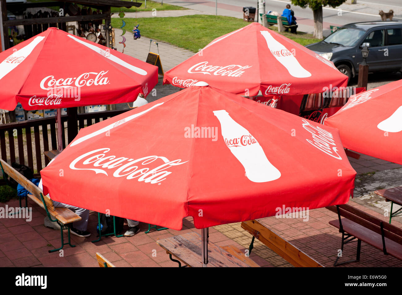 Red coca cola logo sunshades in bar Stock Photo