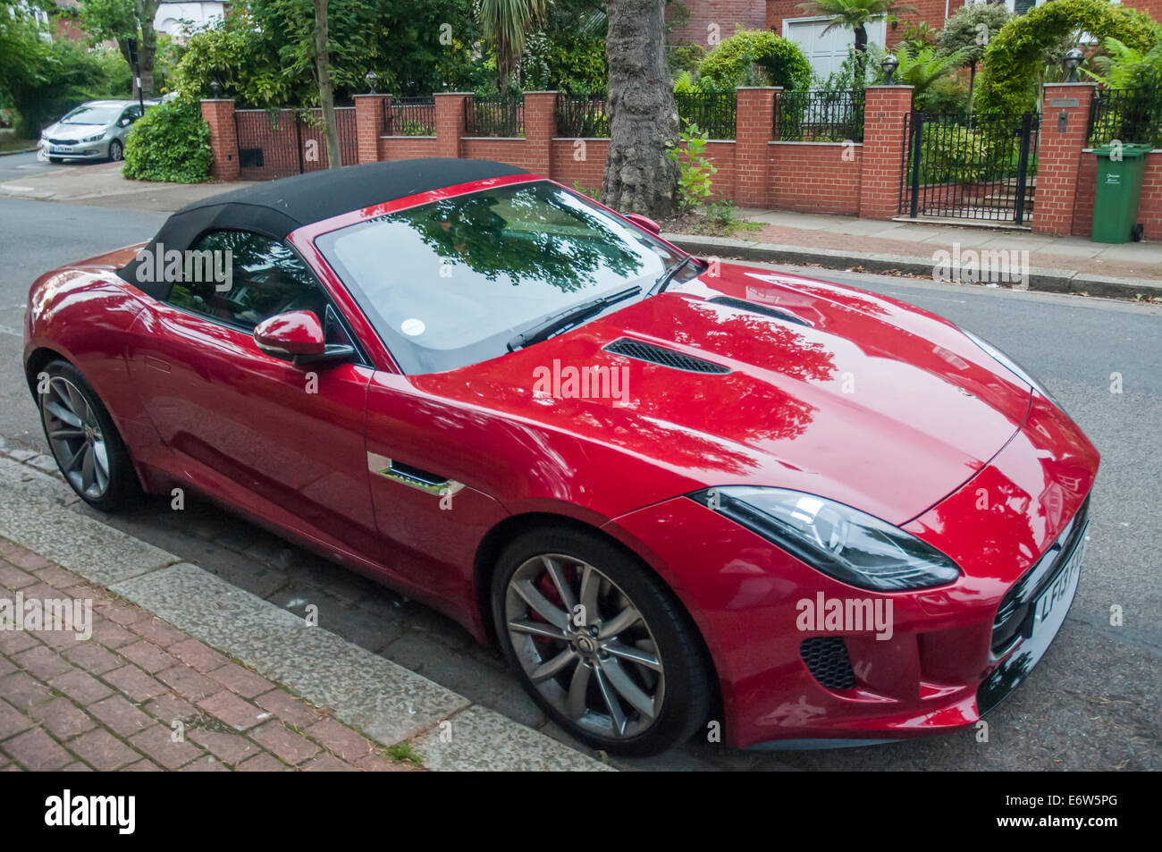Ferrari sports coupe parked in a Hampstead street, London Stock Photo