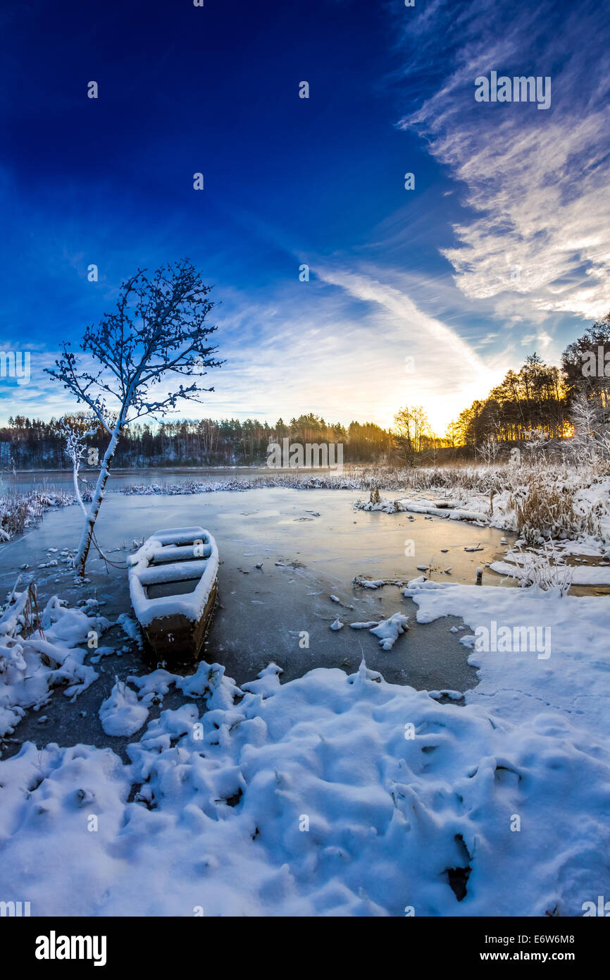 Winter sunrise on the frozen lake Stock Photo - Alamy
