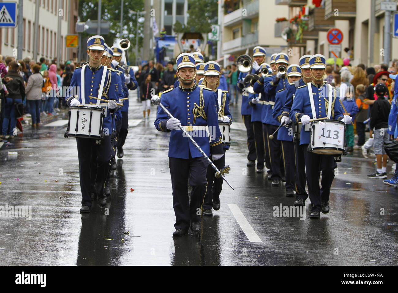 Worms, Germany. 31st Aug, 2014. Members of the 1. Fanfare Corps Groß-Zimmern march in the Backfischfest parade 2014. The first highlight of this year's Backfischfest was the big parade through the city of Worms with 125 groups and floats. Community groups, sport clubs, music groups and business from Worms and further afield took part. © Michael Debets/Pacific Press/Alamy Live News Stock Photo