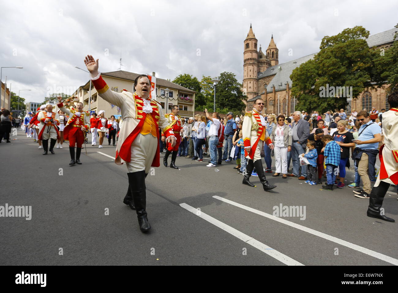 Worms, Germany. 31st Aug, 2014. Members of the Wormser Prinzengarde (Worms Guard of the Prince) march in the Backfischfest parade 2014.The cathedral of Worms can be seen in the background. The first highlight of this year's Backfischfest was the big parade through the city of Worms with 125 groups and floats. Community groups, sport clubs, music groups and business from Worms and further afield took part. © Michael Debets/Pacific Press/Alamy Live News Stock Photo