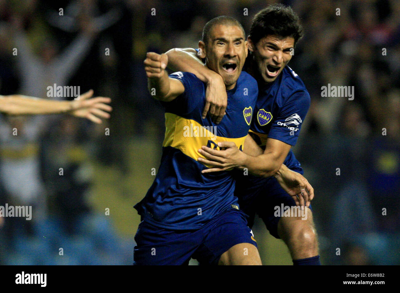 Buenos Aires, Argentina. 31st Aug, 2014. The player Daniel Diaz (L) of Boca Juniors, celebrates a scoring with his teammate Marcelo Meli (R), during the match of the Argentinean First Division Tournament against Velez Sarsfield, in the Alberto J. Armando Stadium, in Buenos Aires, Argentina, on Aug. 31, 2014. (Xinhua/Martin Zabala) (jp) (ah) Credit:  Xinhua/Alamy Live News Stock Photo