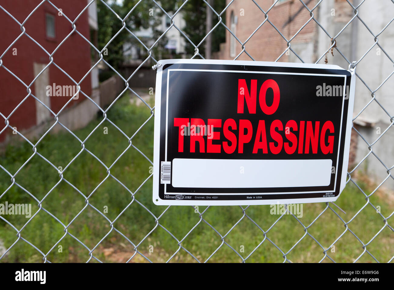 No Trespassing sign on personal property fence - USA Stock Photo