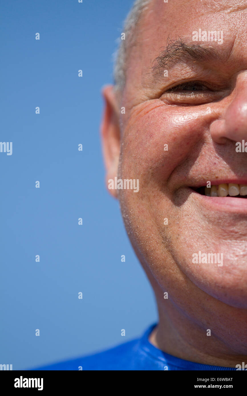 Close up portrait of a man in his sixties. Stock Photo