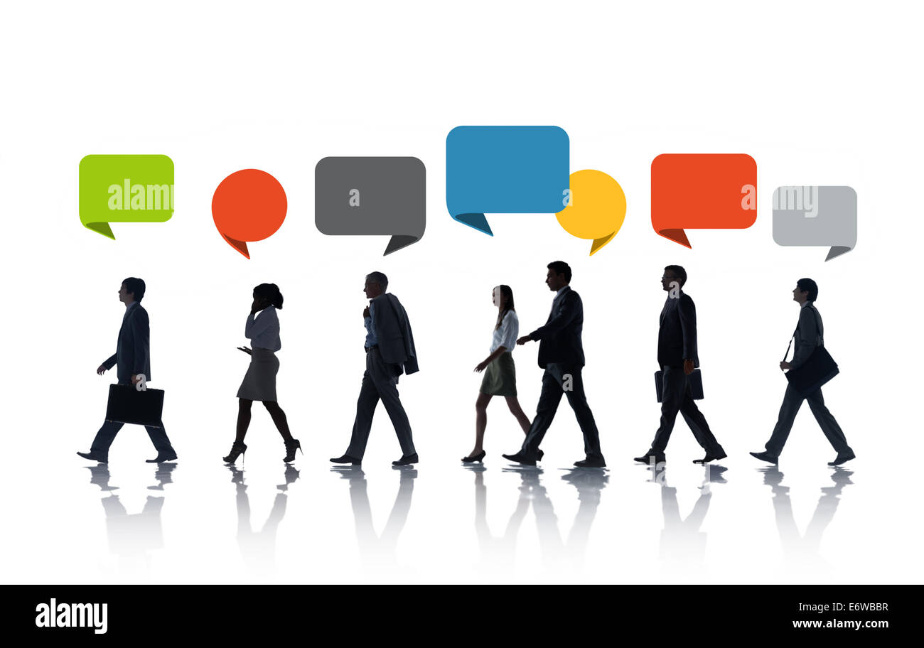 Multiethnic Business People Walking in a Row with Speech Bubble Stock Photo