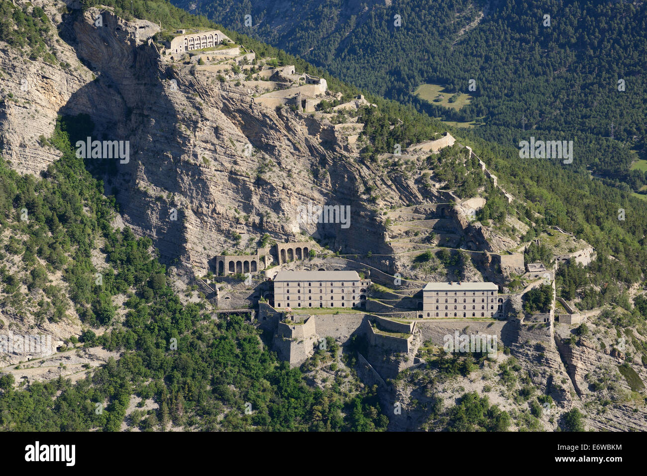 AERIAL VIEW. Military fortress above the Ubaye Valley. Fort de Tournoux, La Condamine-Châtelard, Alpes-de-Haute-Provence, France. Stock Photo