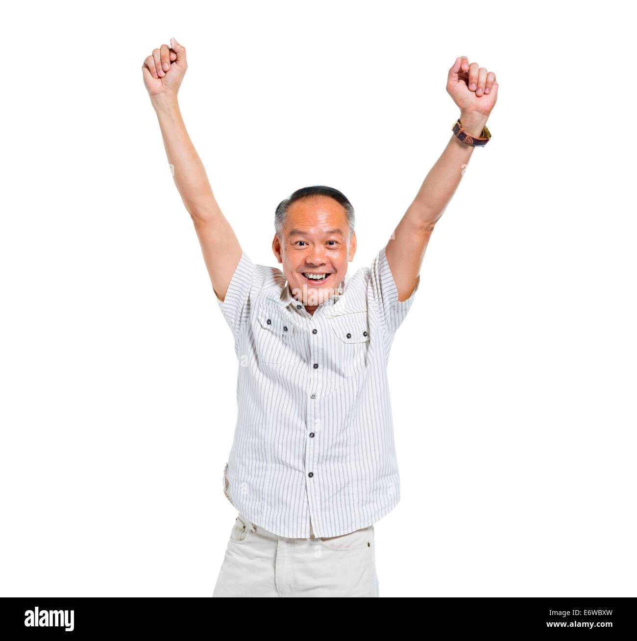 Cheerful Old Asian Man Celebrating Stock Photo