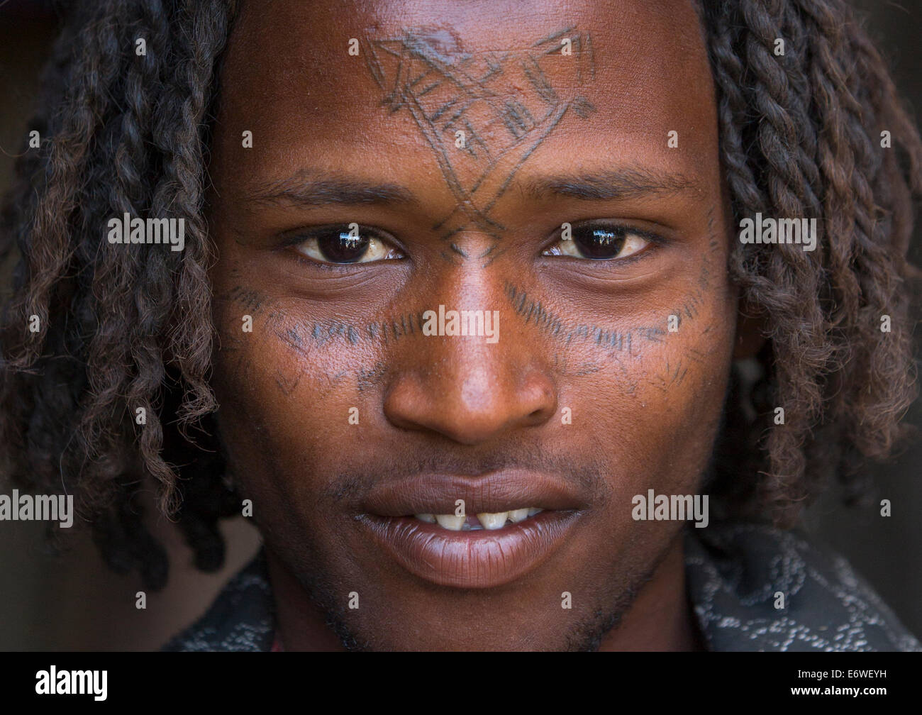 Afar Tribe Man With Curly Hair And Facial Tattoos, Assayta, Ethiopia Stock Photo