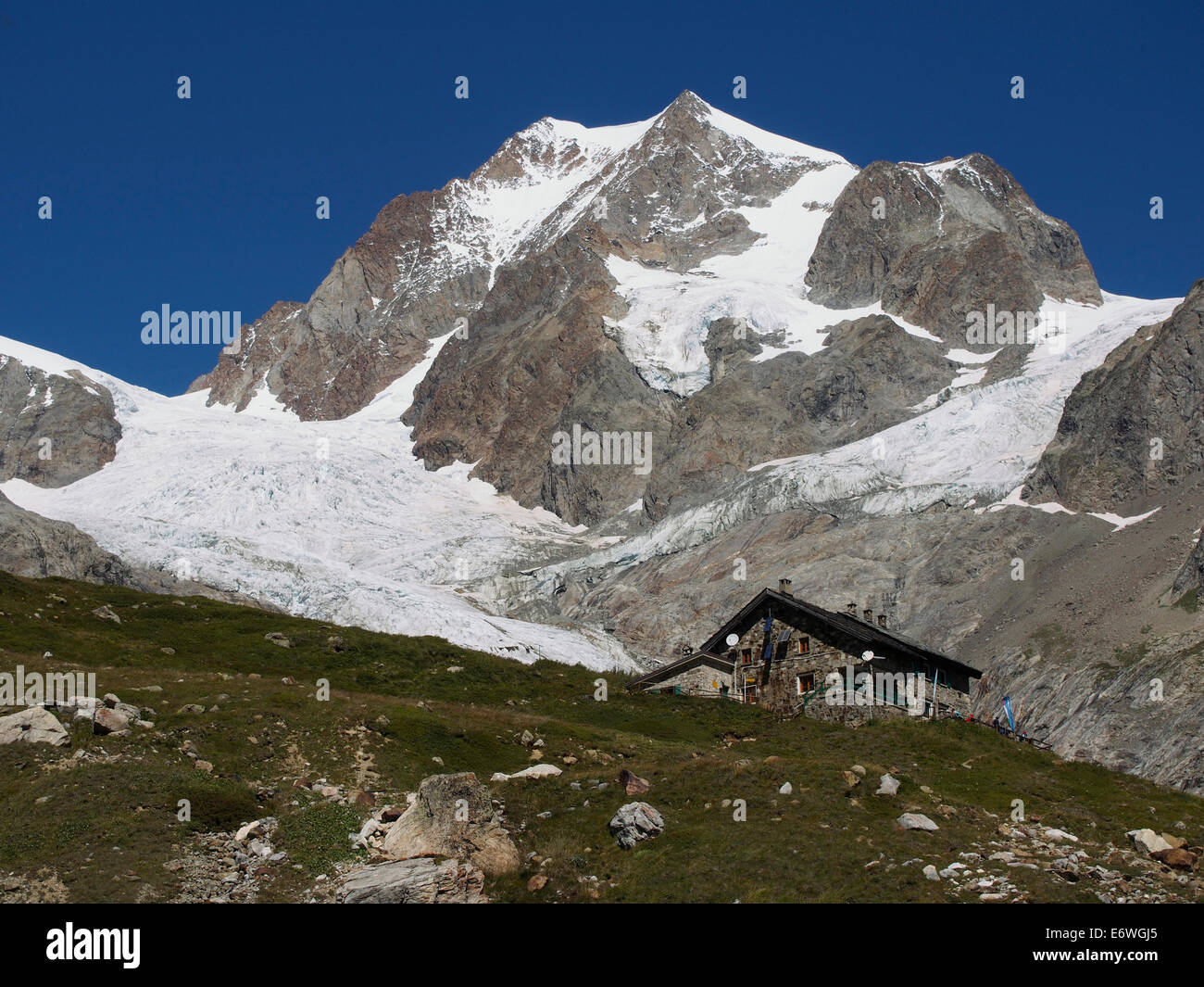 Refuge Elisabetta with Aiguille des glaciers behind, Italian Alps Stock Photo
