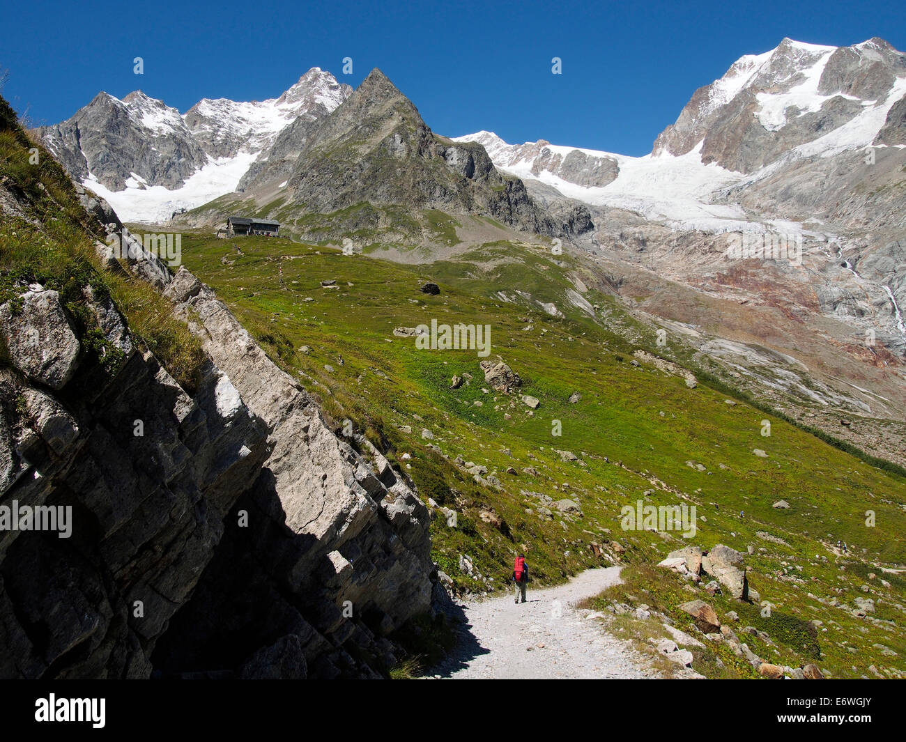 Trekking on the Tour of Mont Blanc below Refuge Elisabetta, Italian Alps Stock Photo