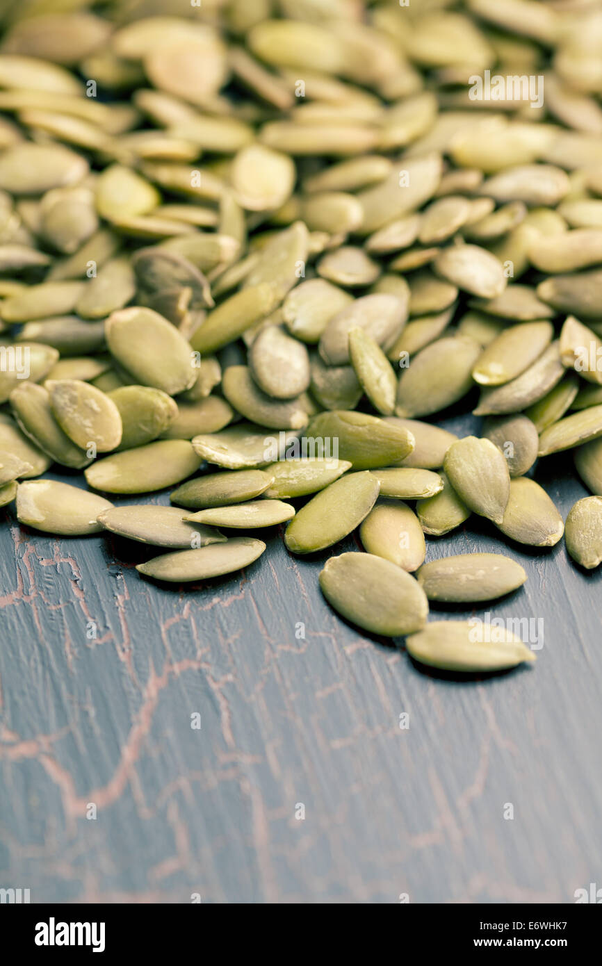 pumkin seeds on old table Stock Photo