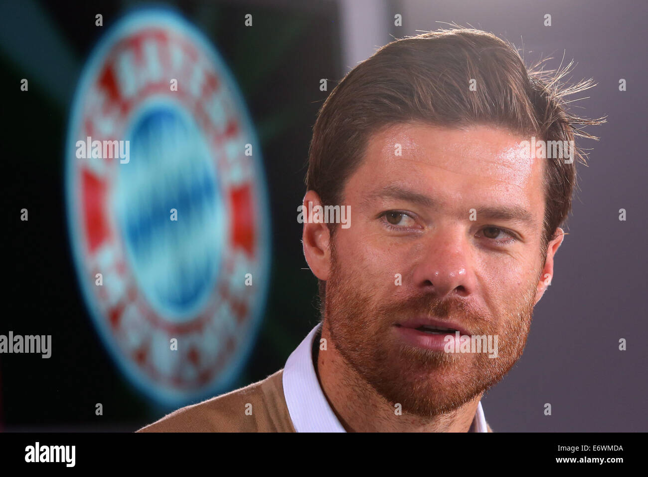 New signing Xabi Alonso of FC Bayern Munich looks on during a press conference at Bayern Muenchen's headquarter Saebener Strasse in Munich, Germany, on 01 September 2014. Photo: Alexander Hassenstein/dpa Stock Photo