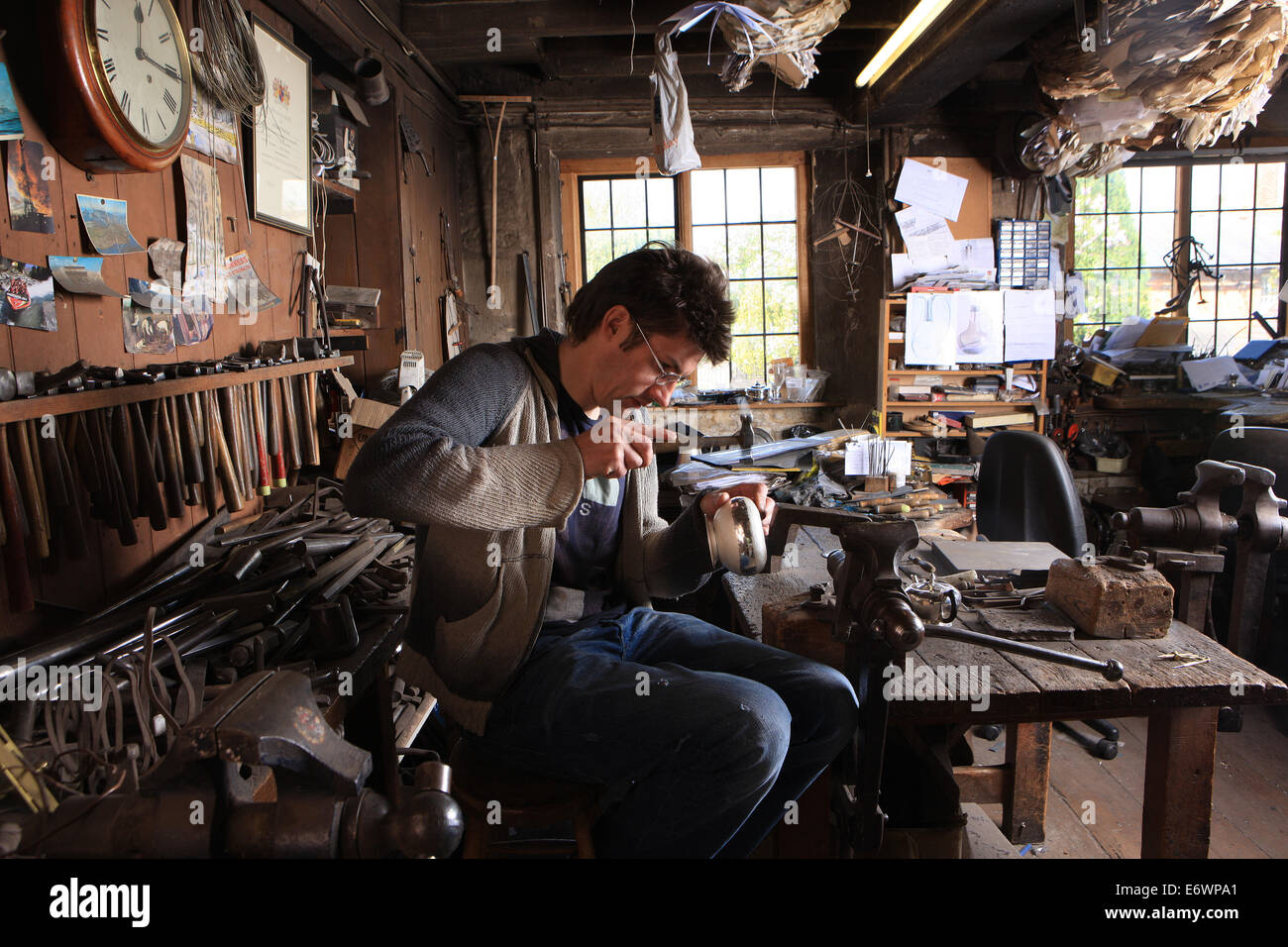 William Hart a Gold & Silversmith working in his Arts and Craft Stock