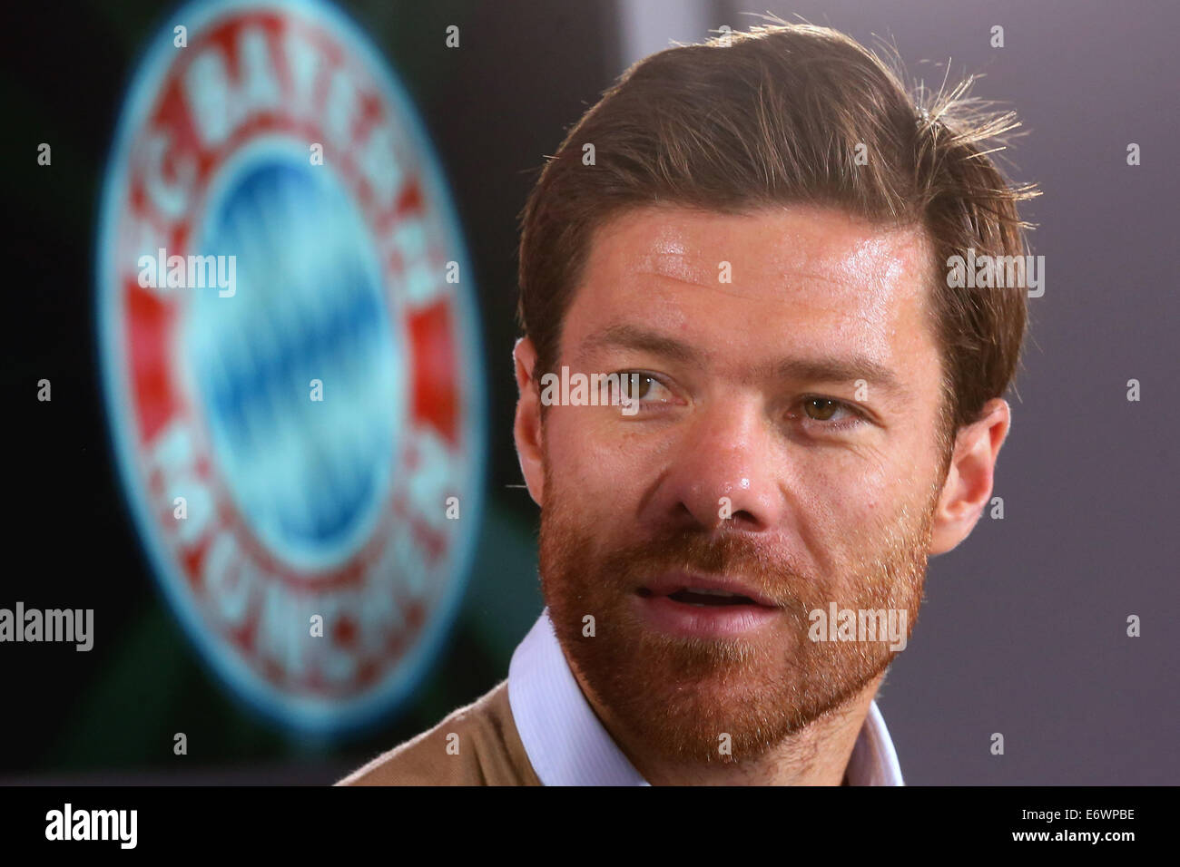 New signing Xabi Alonso of FC Bayern Munich looks on during a press conference at Bayern Muenchen's headquarter Saebener Strasse in Munich, Germany, on 01 September 2014. Photo: Alexander Hassenstein/dpa Stock Photo