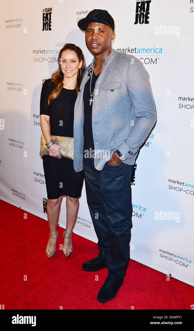 Team Fat Joe and guests celebrate Market America launch - Arrivals  Featuring: Mary Floyd,Cliff Floyd Where: Miami Beach, Florida, United  States When: 09 Feb 2014 Stock Photo - Alamy