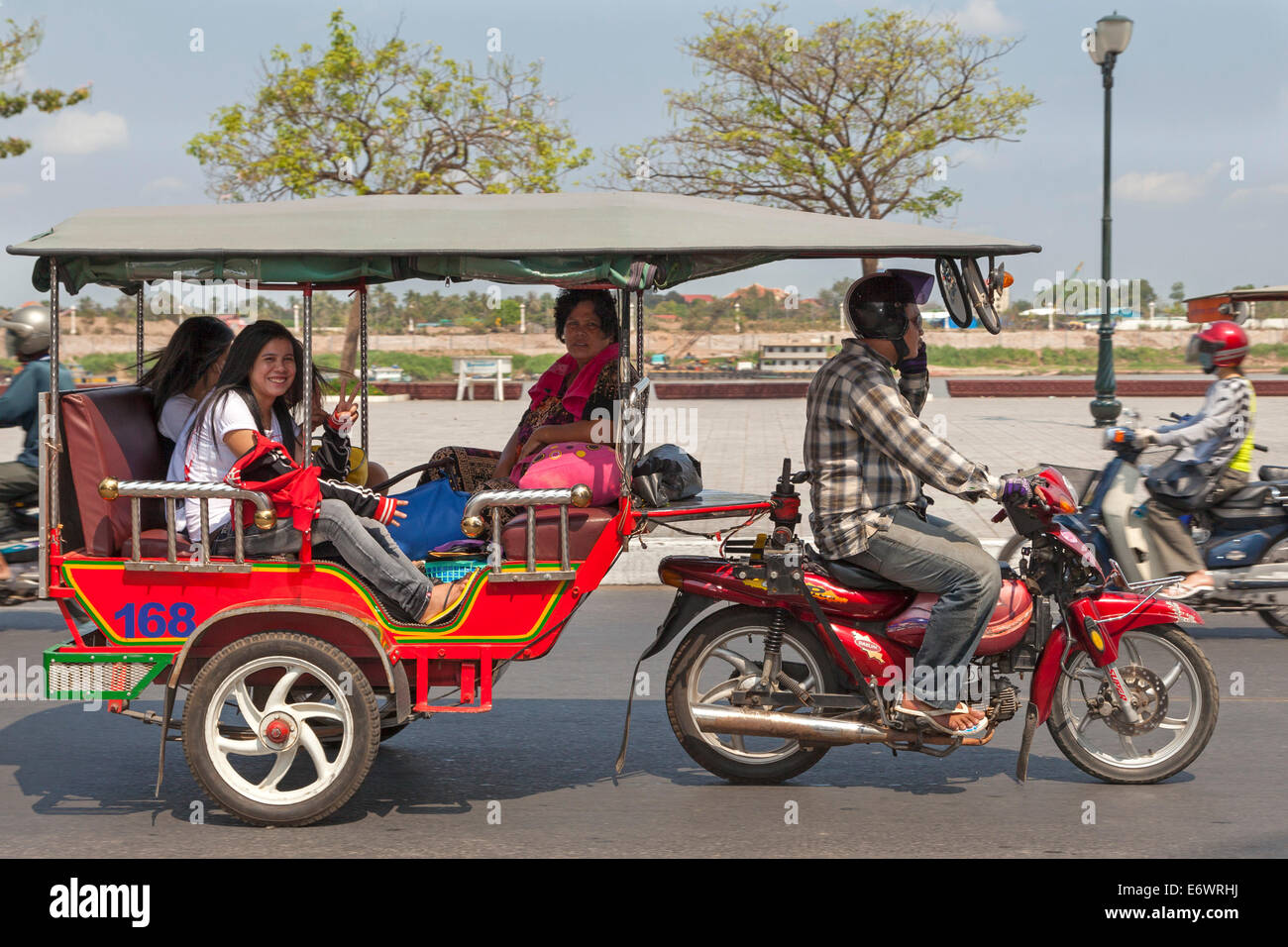 Passengers in a Tuk Tuk, Phnom Penh, Cambodia Stock Photo