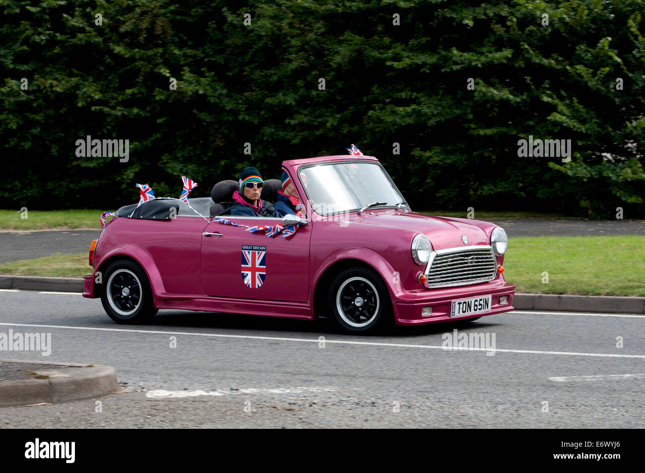 Mini convertible car on the Fosse Way road, Warwickshire, UK Stock Photo