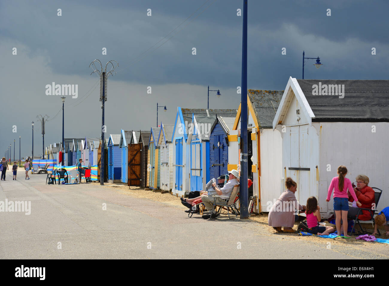 Beach huts on promenade, Felixstowe, Suffolk, England, United Kingdom Stock Photo