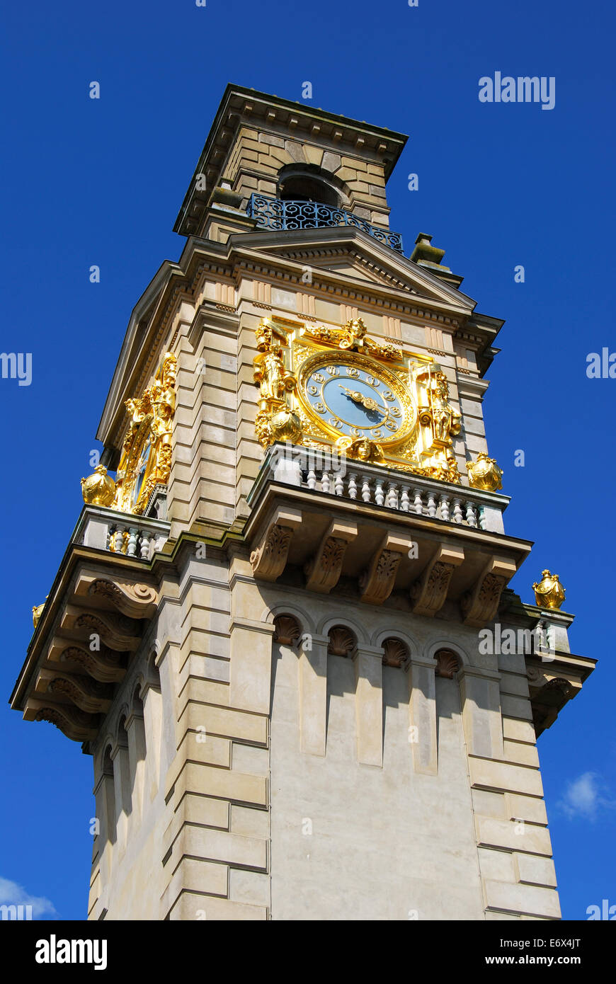 Gilded clock face on clock tower, Cliveden, Taplow, Buckinghamshire, England, United Kingdom Stock Photo