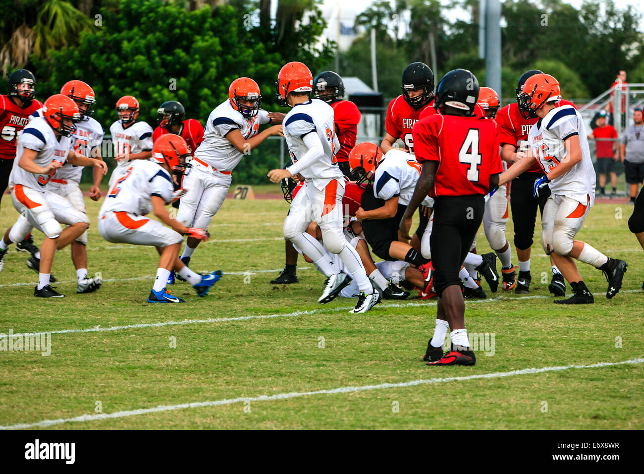 Lemon Bay Junior Varsity High School Football team of Englewood against Port Charlotte Pirates HS team Stock Photo