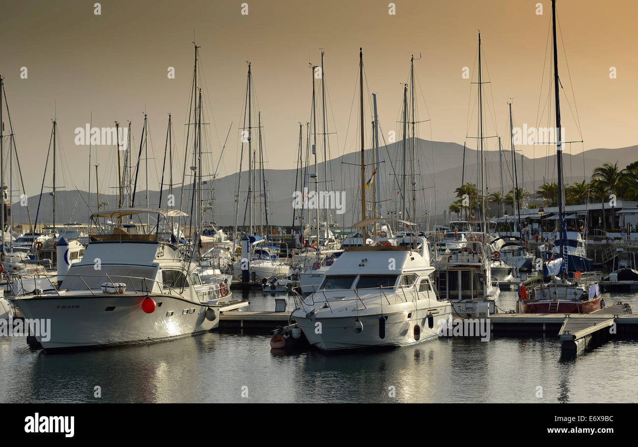 Yachts in the evening light, marina of Puerto Calero, Lanzarote, Canary Islands, Spain Stock Photo