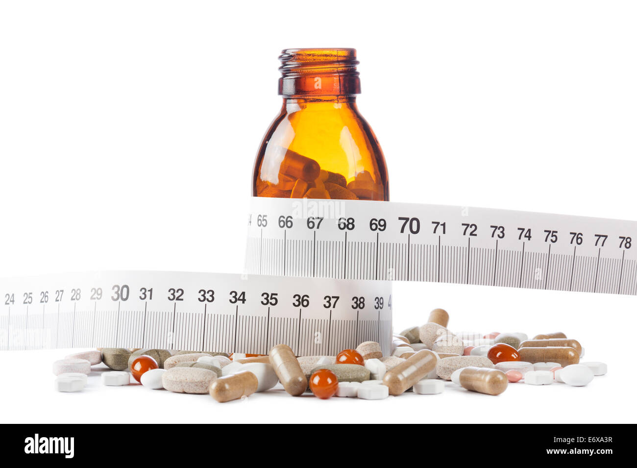 capsules for diet with pills bottle and meter on white background Stock Photo