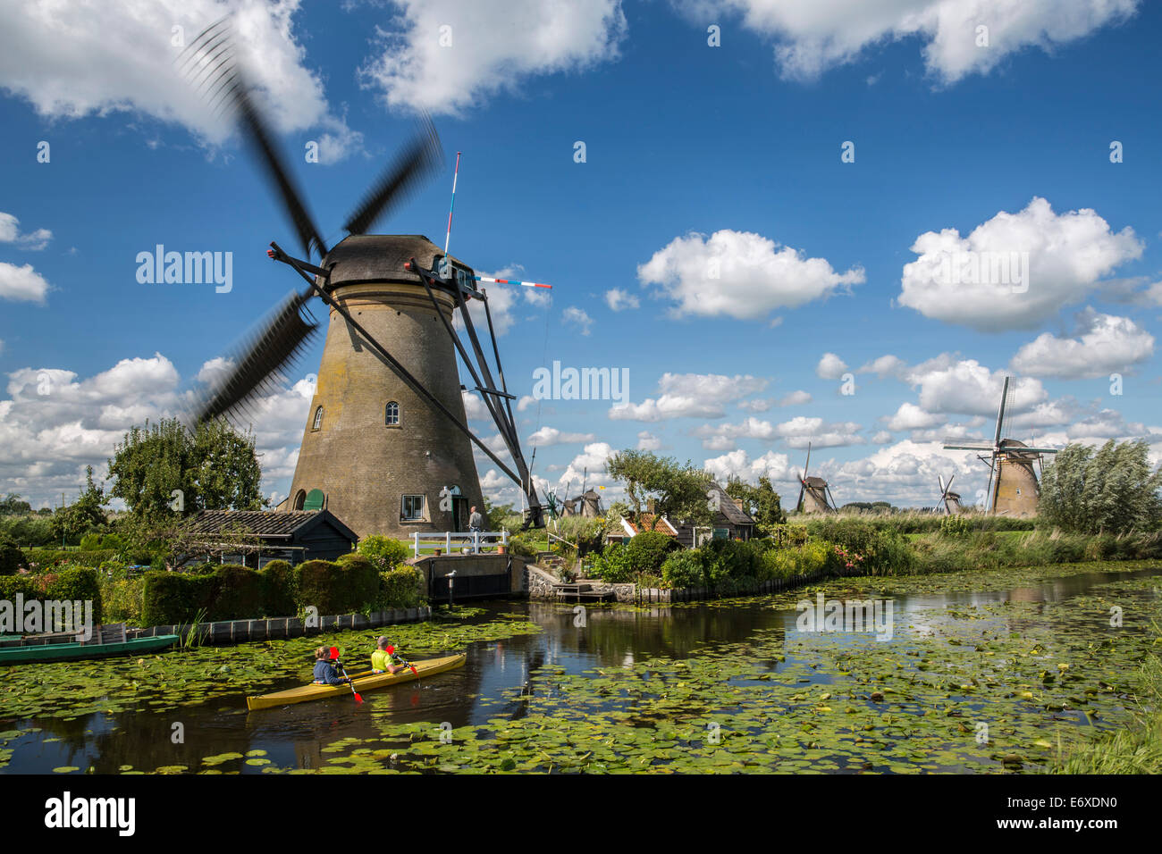 Netherlands, Kinderdijk, Windmills in Alblasserwaard polder, Unesco World Heritage site. Kayak Stock Photo