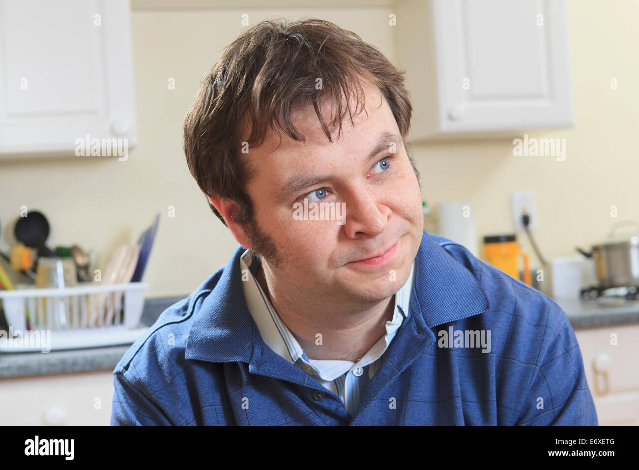 Man with Aspergers in his home living independently Stock Photo