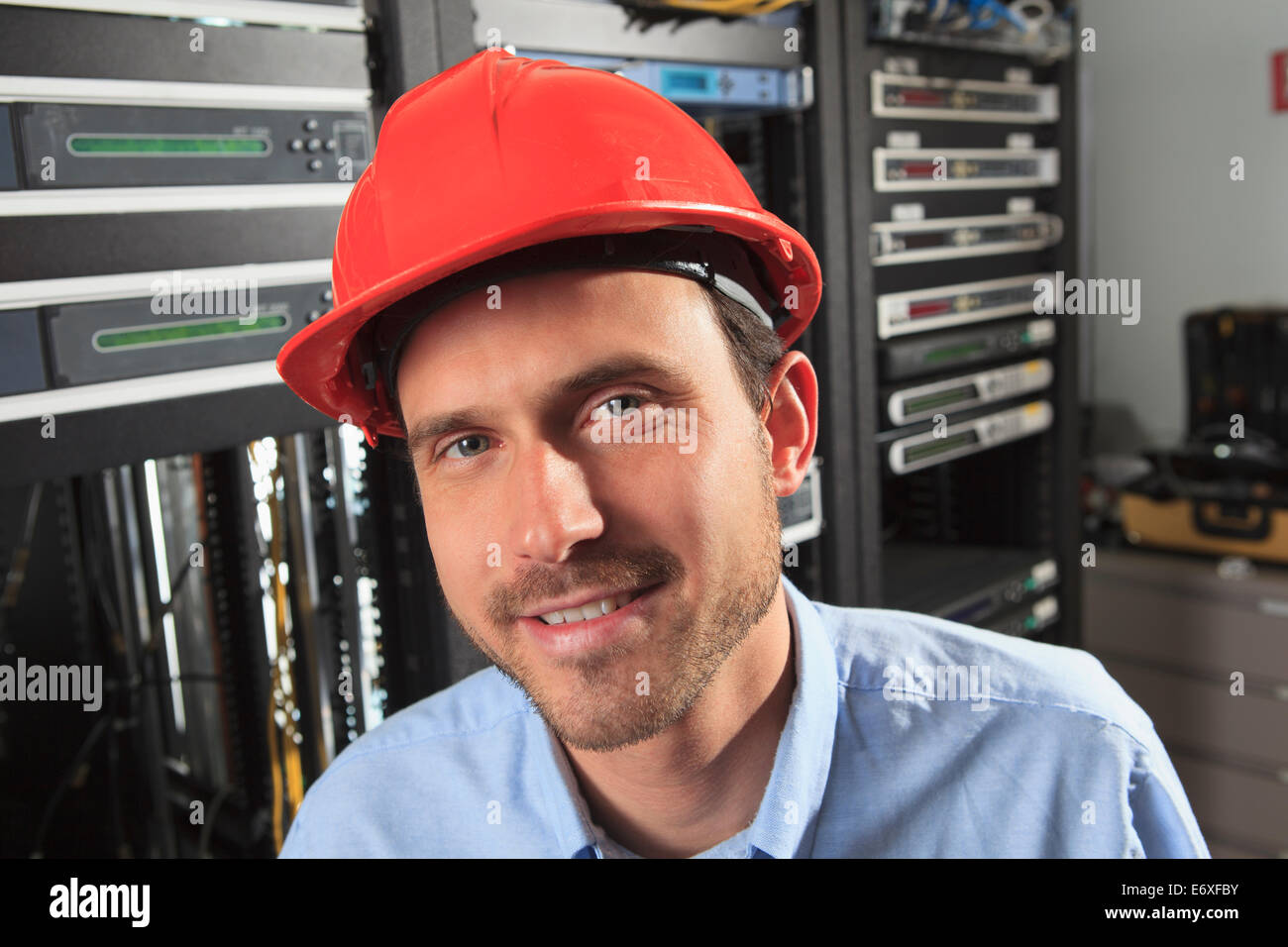 Network engineer in data distribution center Stock Photo