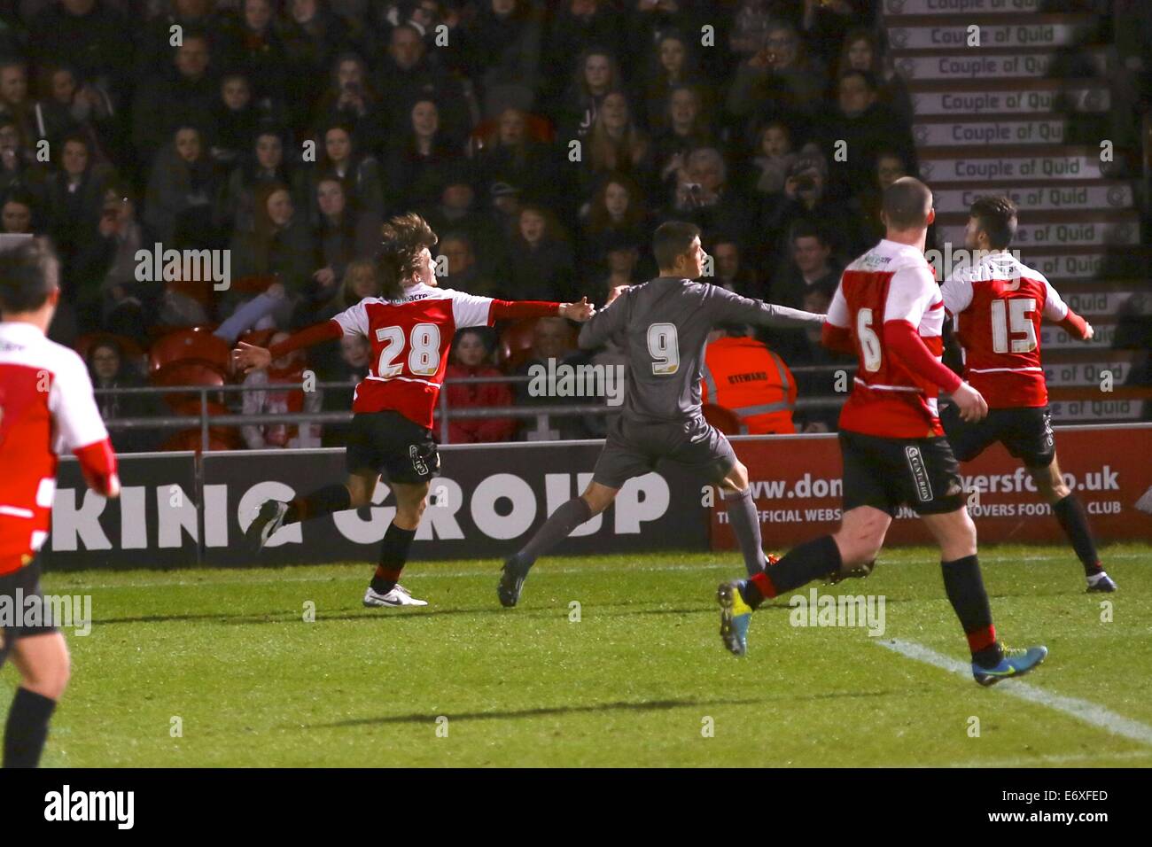 One Direction's Louis Tomlinson makes his Doncaster Rovers football debut  at Keepmoat Stadium Featuring: Louis Tomlinson Where: Doncaster, United  Kingdom When: 26 Feb 2014 Stock Photo - Alamy